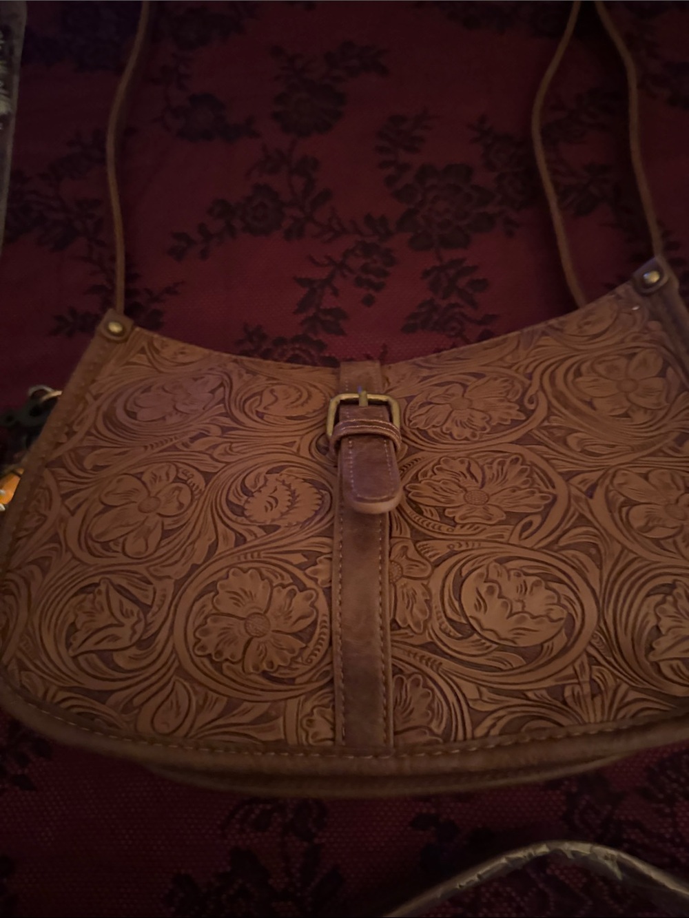 Women’s crossbody handbag.. I think it is called vegan leather..